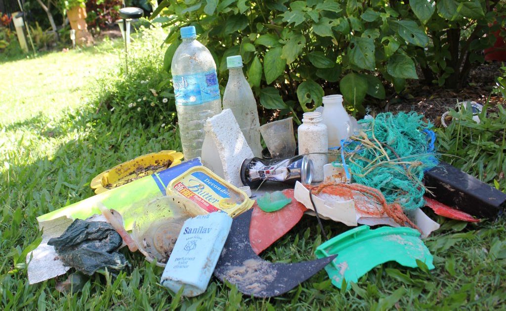 Floods bring extra rubbish to beaches. Floods bring extra rubbish to beaches.